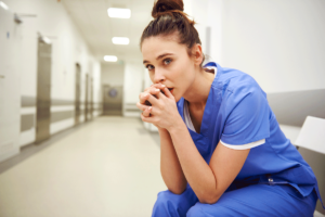 a woman deals with acute trauma at work as a nurse