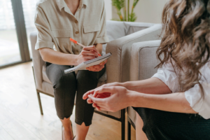 female patient discussing the difference between esketamine vs. ketamine with a mental health professional.